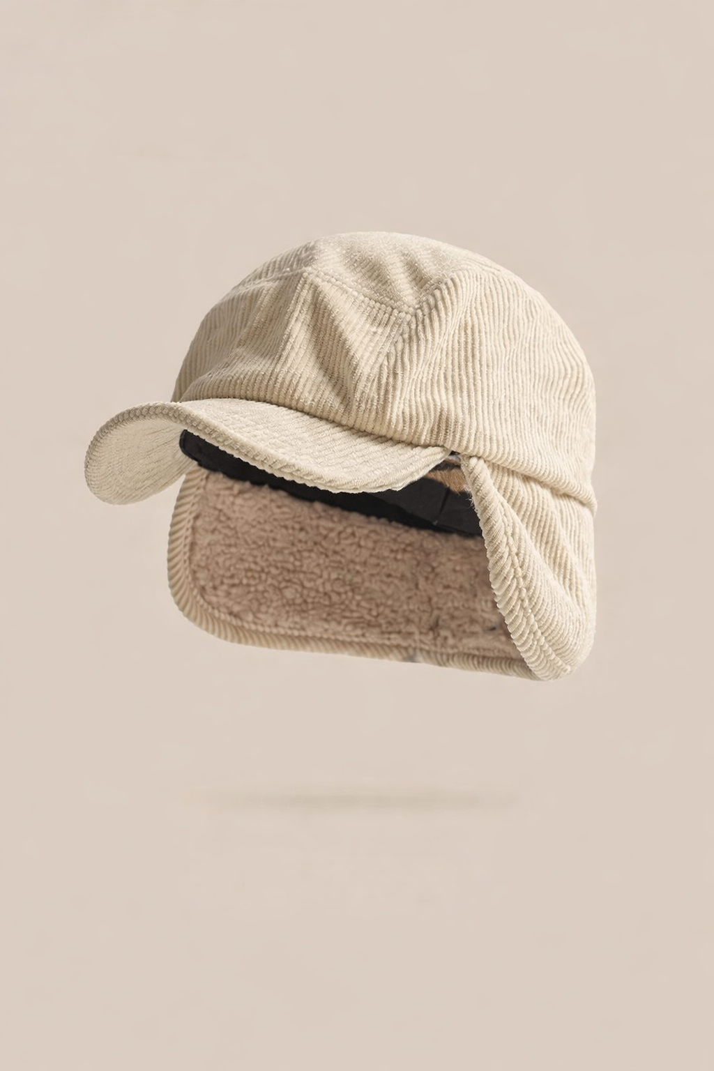 FROSTLINE CORDUROY EARFLAP CAP