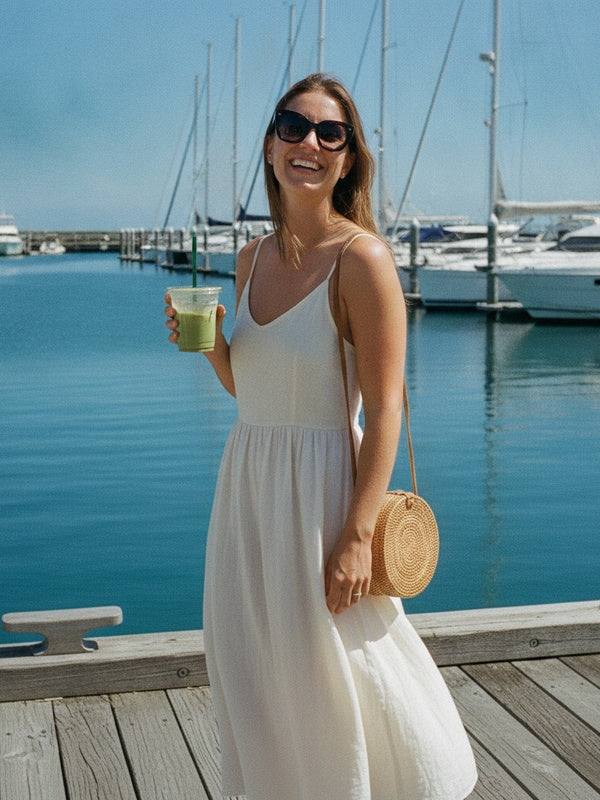 Sunny afternoon at Viaduct Harbour marina in white linen dress